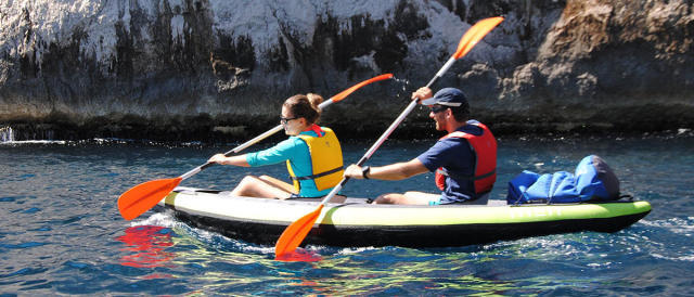 two people in inflatable kayak