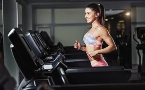girl running on treadmill
